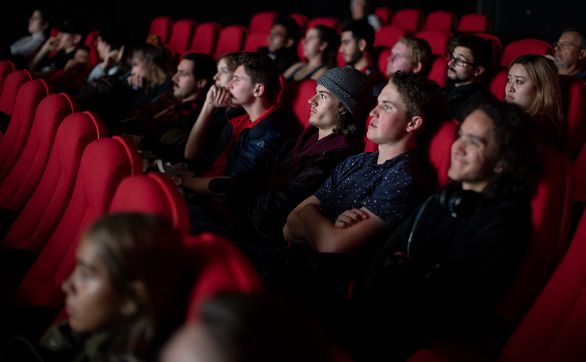 Students sitting in the Bosa theatre