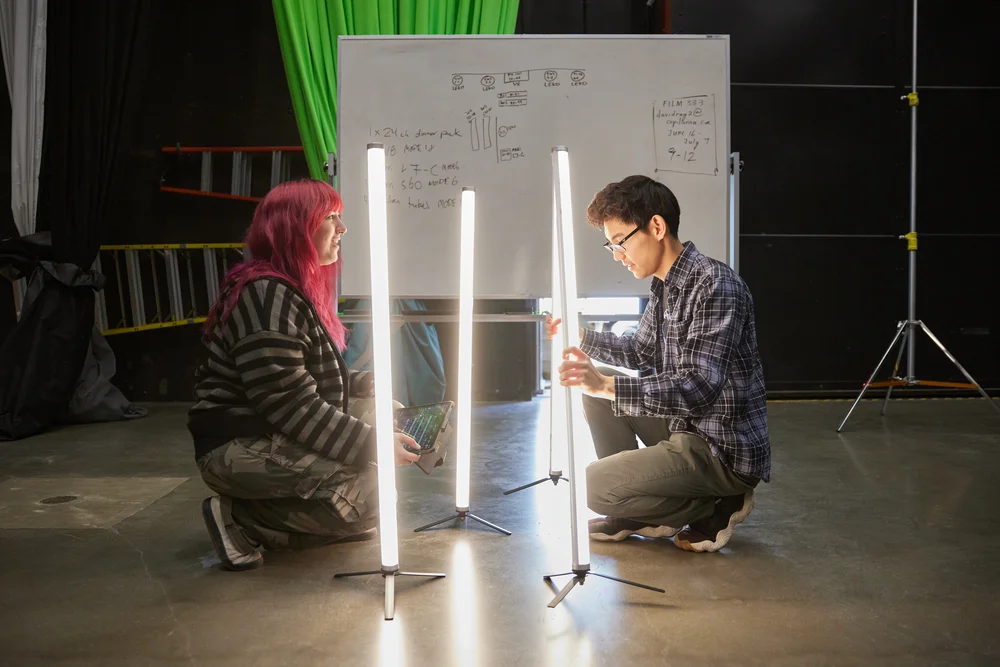 Motion Picture Arts students setting up production lighting