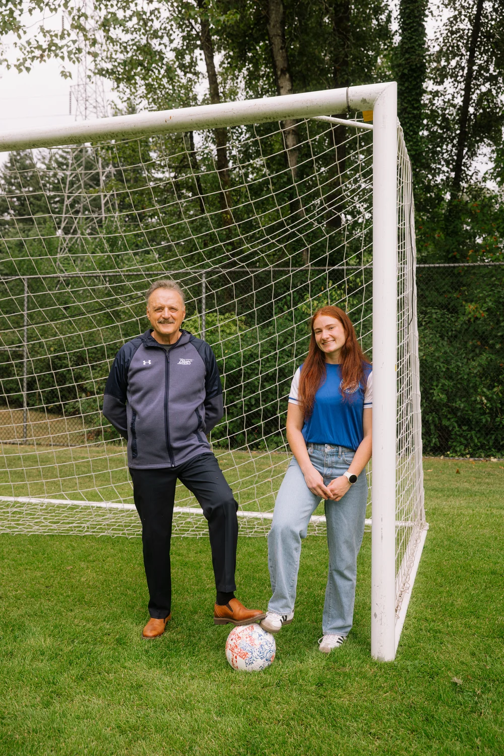 Isabella with a member of the Capilano Athletics staff