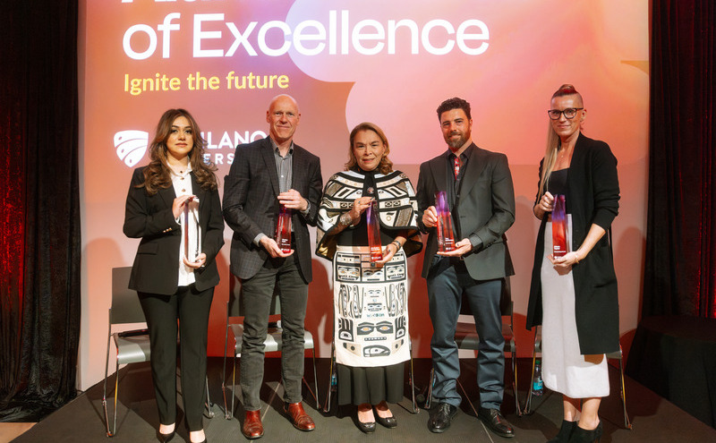 The five recipients of awards at CapU's 2026 Alumni Awards of Excellence ceremony.