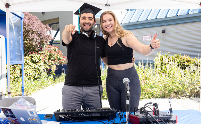 CapU grad with a DJ.