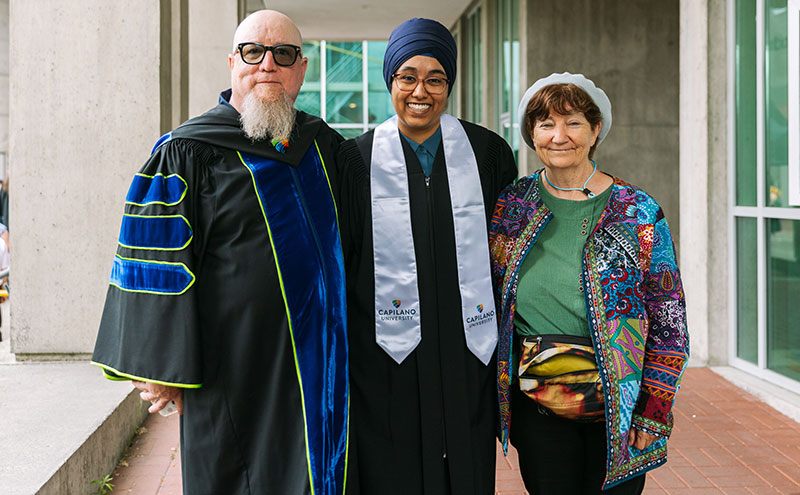 Student with mentors at Convocation