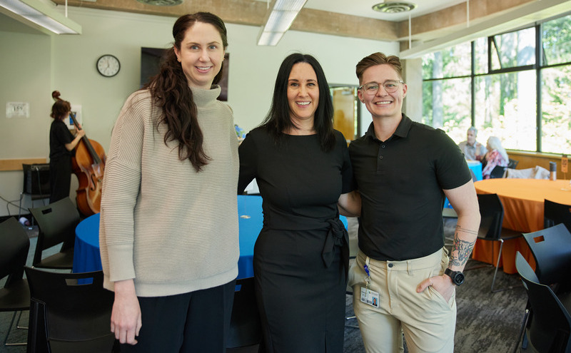 Three CapU employees at the Long Service Awards.