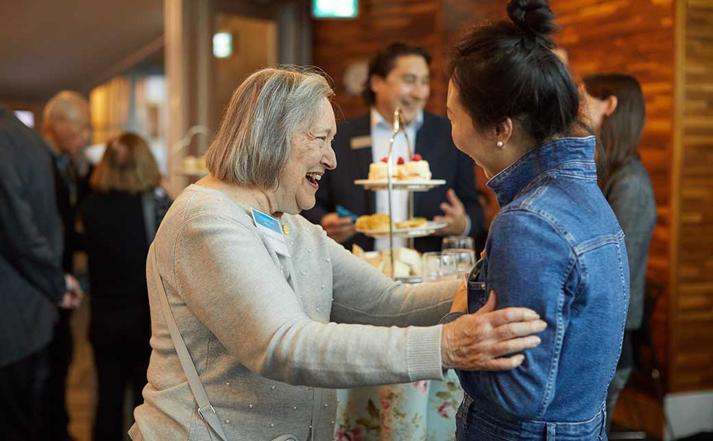 CapU community members meeting at the Momentum event.