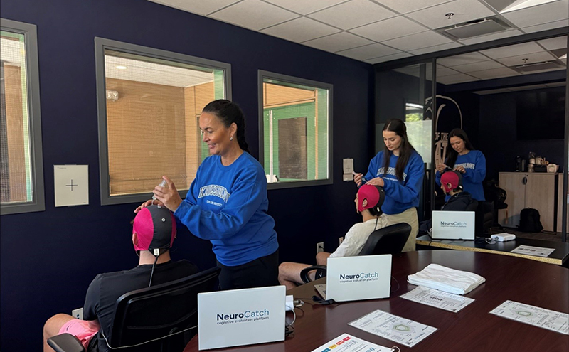 Donna Perry, Faculty of Global & Community Studies (School of Kinesiology) with her student research assistants