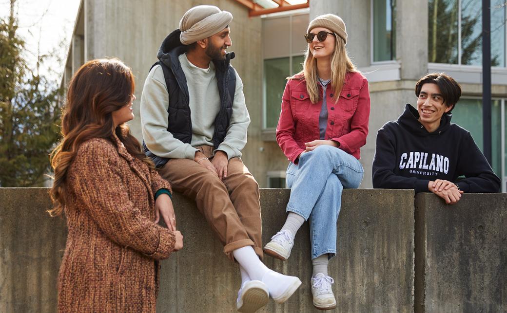 Students sitting outside at CapU Squamish Campus