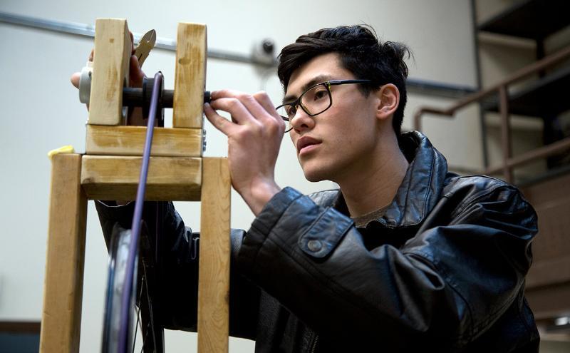 Student in lab working on project