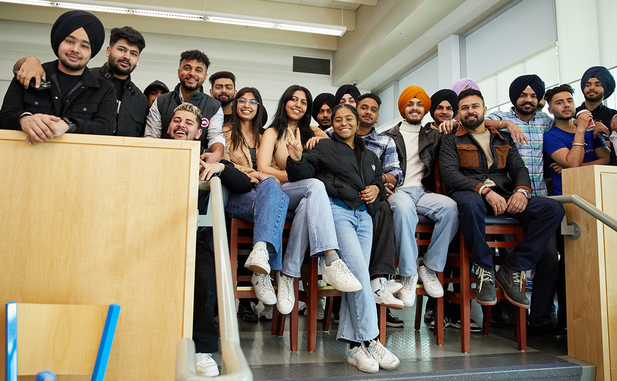 Students watching the student dance performances in the Birch Building Cafeteria