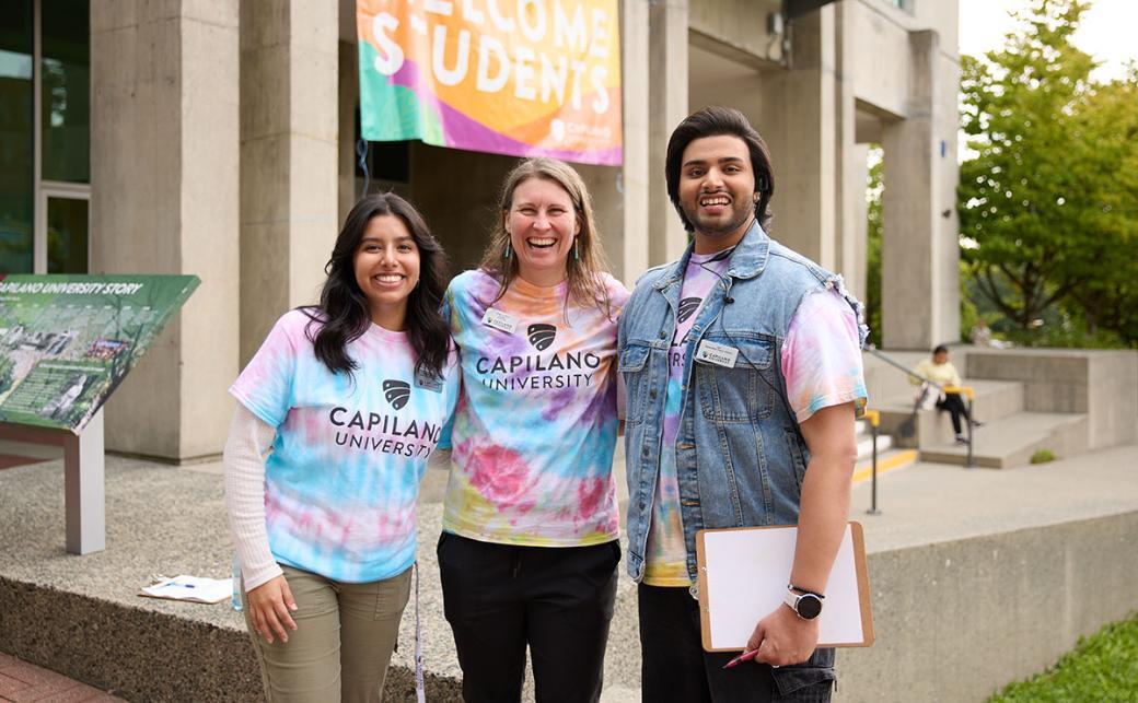 Student life staff in front of Birch Building