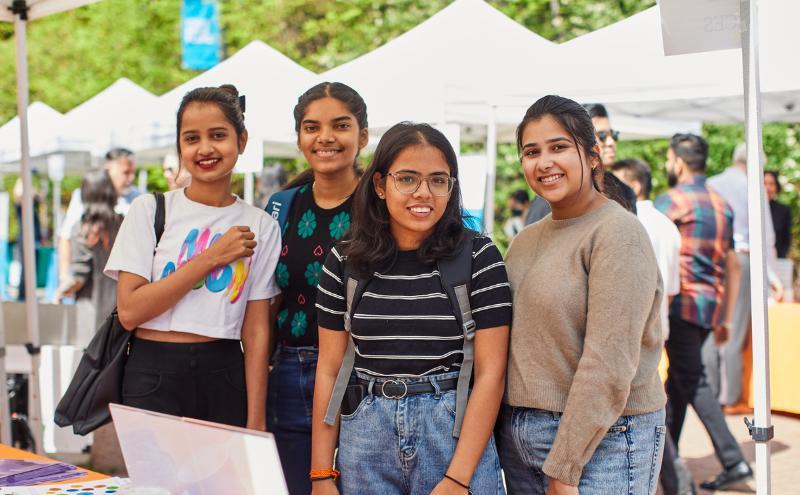 Group of new students posing at 2023 summer orientation