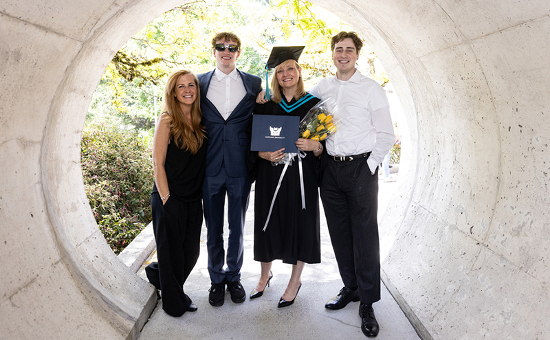 Student celebrating with her family at Convocation