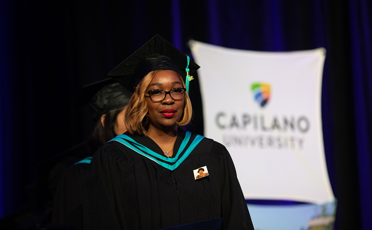 Student on stage at Convocation