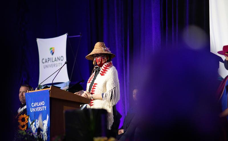 Speaker on stage at Convocation