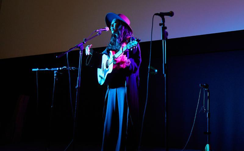 Singer-songwriter Wanting Qu performing in honour of Women's History Month