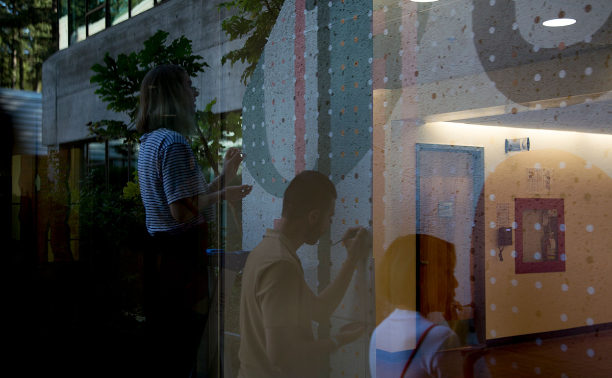 IDEA students working on their mural