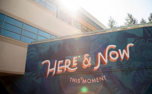 Here and Now mural on the exterior of the Cedar Building 