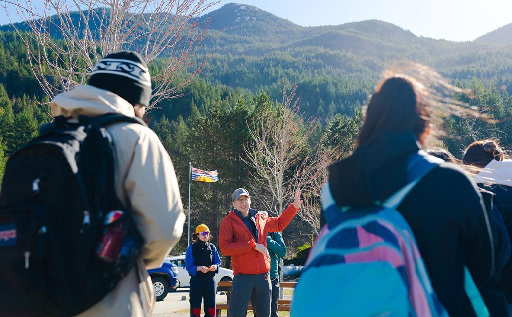 Instructor teaching students outside 