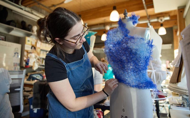 During an Indigenous Costuming intensive, students applied finishing touches to original designs
