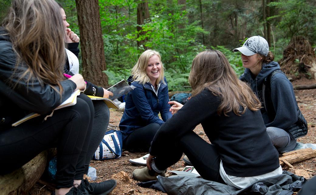 Students sitting outside talking