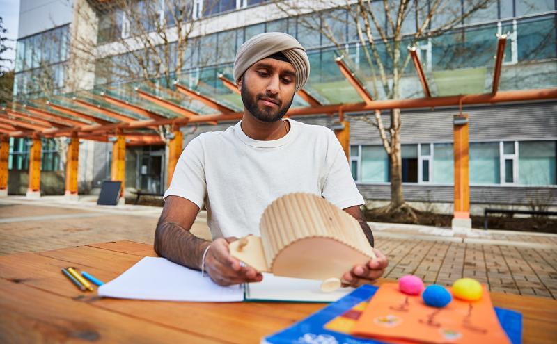 Student working outside at CapU Squamish