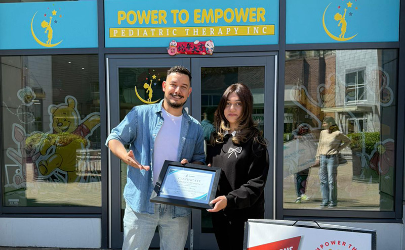 Surrey Food Bank presents a Community Impact Award to Dr. Farah Rattansi and My Empower Therapy for their tremendous support and donations throughout the year.