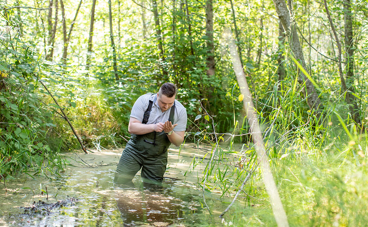 Photo of Harrison Smith in Maplewood Flats wetlands