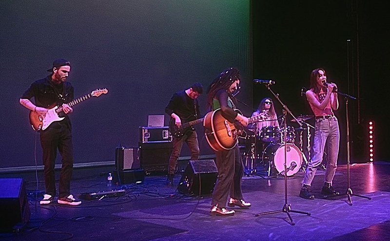 Taking the stage with my band, The Jupiters, at the BlueShore at CapU. We met through the AEM program and this was our first performance as a band