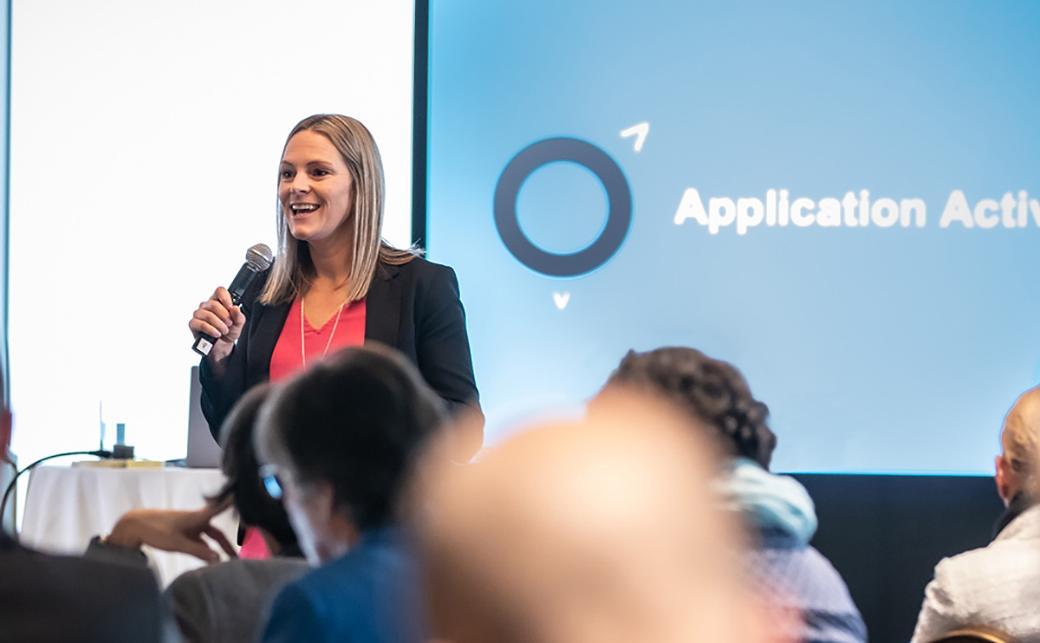 CapU instructor and researcher Kara Walker presenting the findings of the Conference Legacy Impact Study