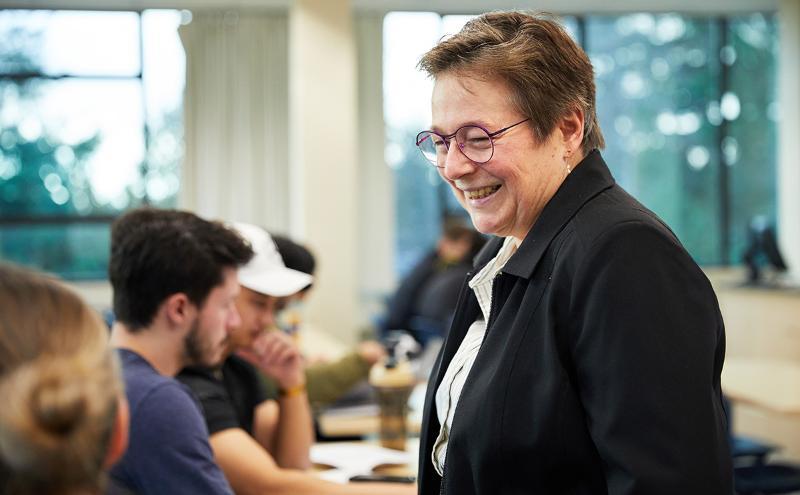 Instructor talking to students