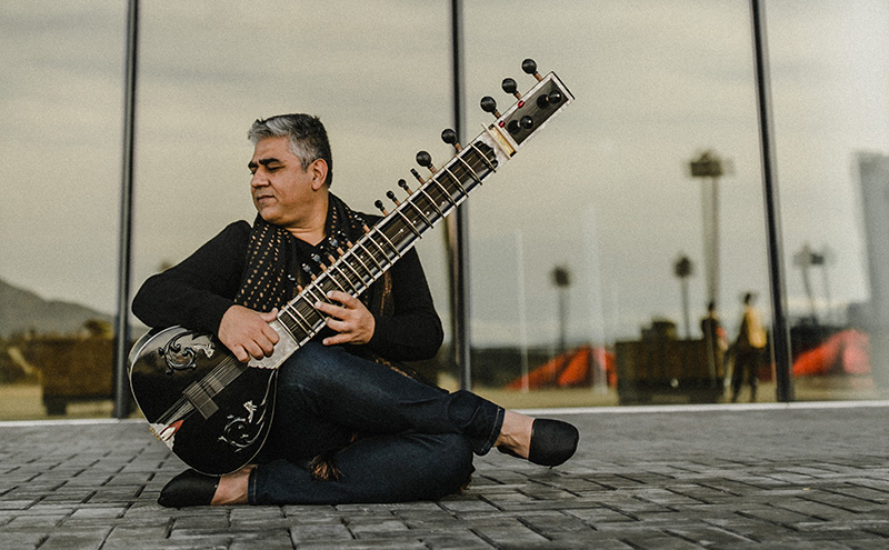 Mohamed Assani playing an instrument