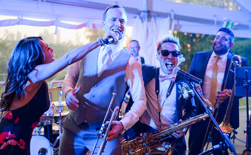 Reuben Avery singing at wedding