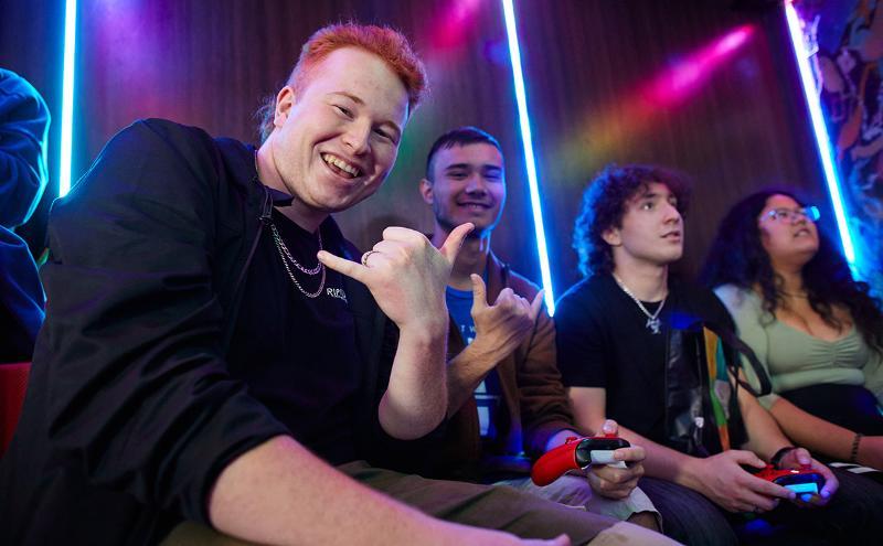 Enjoying video games in a mobile gaming truck