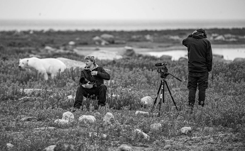 Martin Gregus Jr. outside taking photos