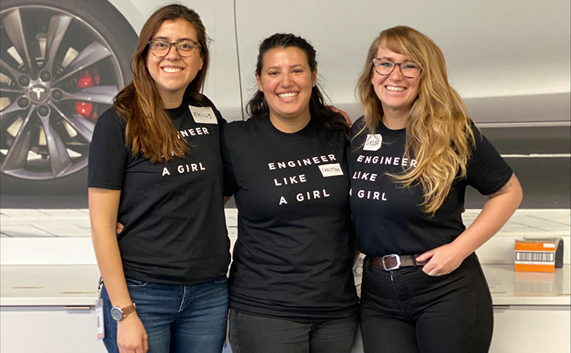 Teresa with coworkers at an event