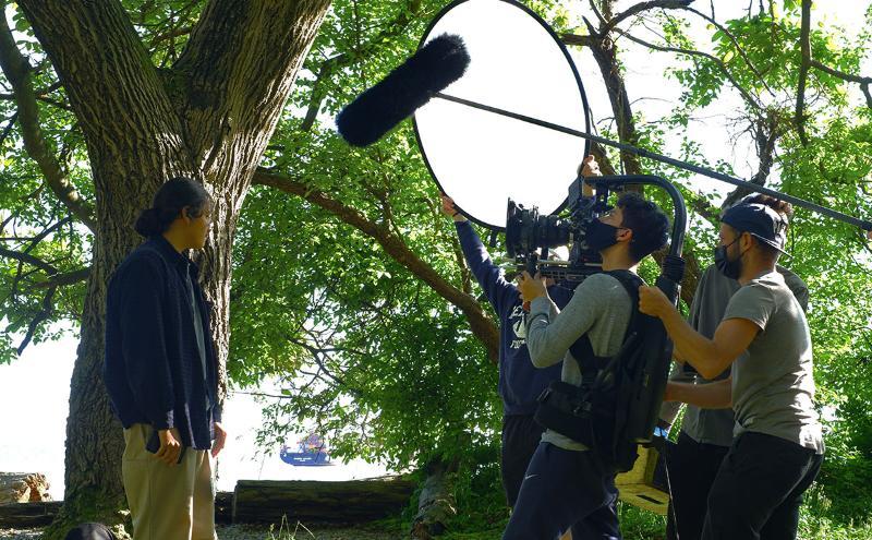 Students filming outside 