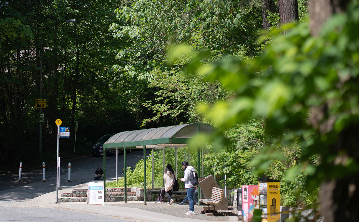 Students waiting at the bus stop outside CapU's North Vancouver campus.