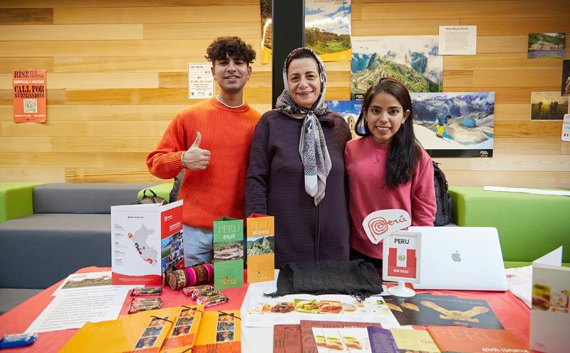 Students learning about different cultures from around the world during International Education Week fair.