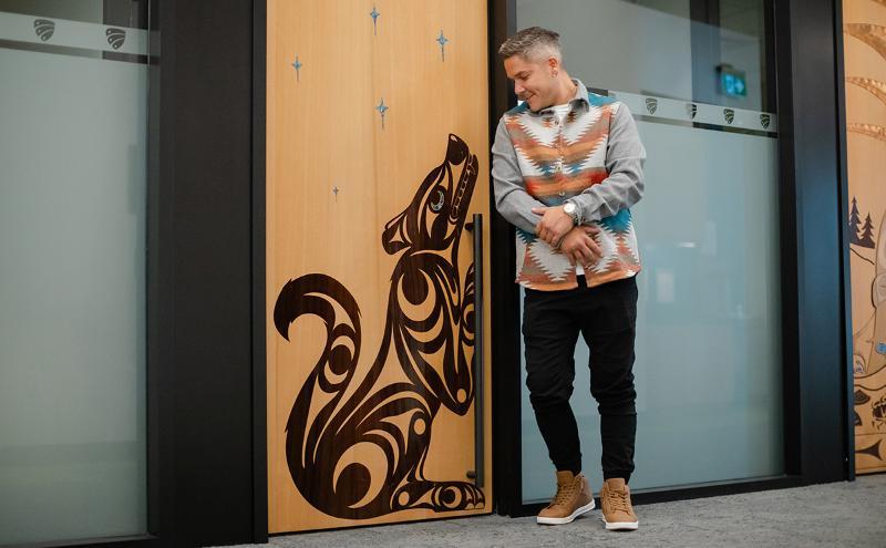 Jordan Gallie of Tsleil-Waututh Nation, designed a CapU Lonsdale door that features a wolf. The wolf symbolizes family and togetherness because wolves are one of the few creatures that mate with their partners for life.
