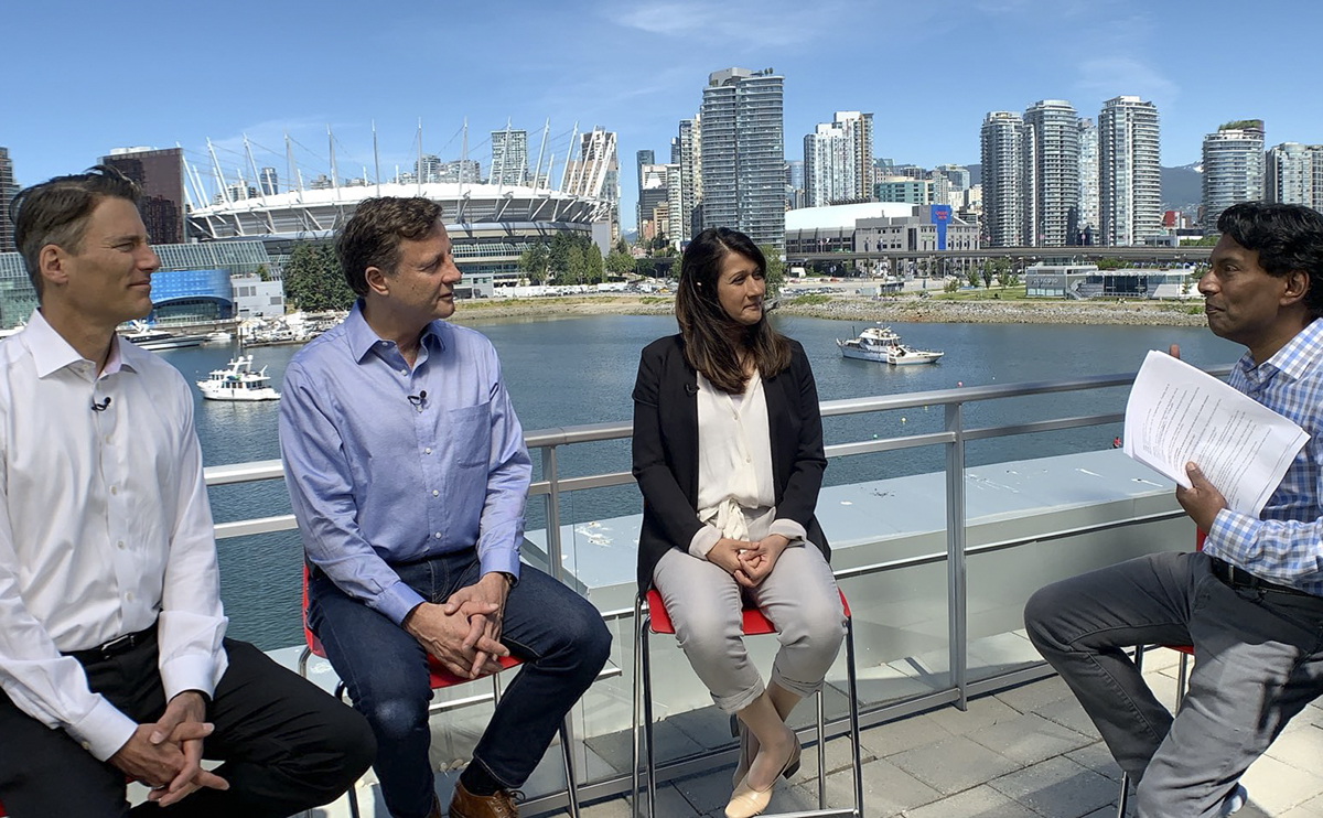 Juvarya being interviewed by Ian Hanomansing for TV with former Mayor Gregor Robertson and Dr. Mark Jaccard