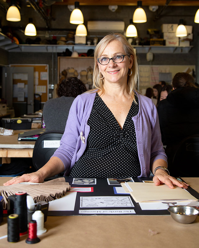 Photo of Kim Bothen in costuming studio