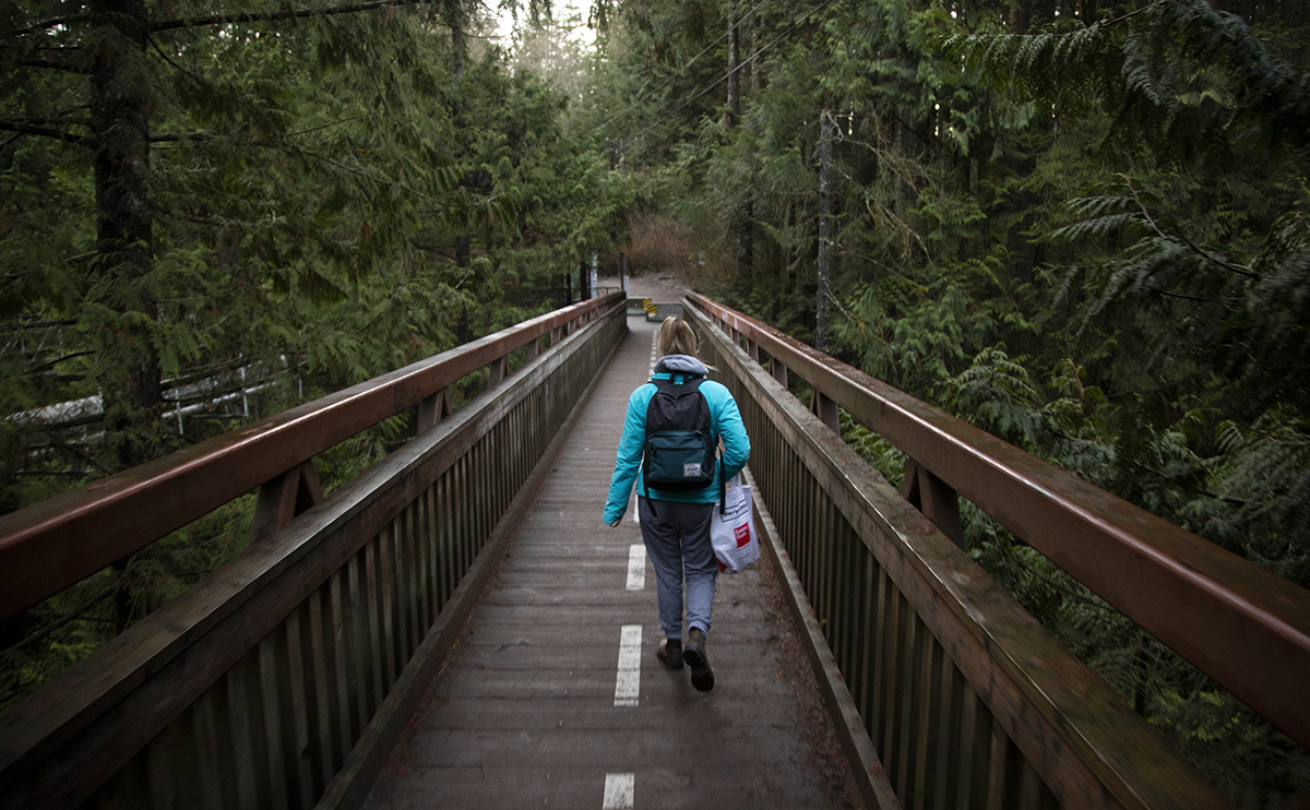 Samantha Doyle walking across a bridge