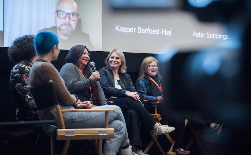 Presenters of the film alliance sitting on a stage