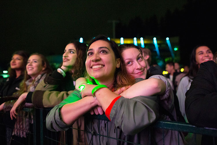 Students listen to a performance by Hey Ocean! at CapFest on Saturday, Sept. 22, 2018.