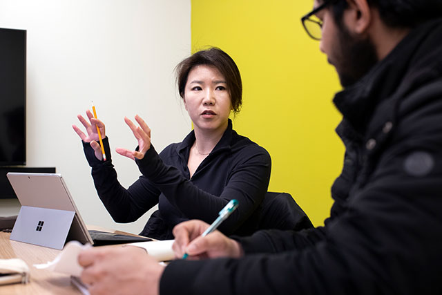 Working on a group project at CapU Lonsdale on Feb. 13, 2020. (Photo by Tae Hoon Kim)