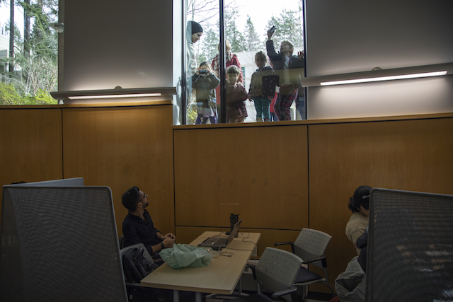 Children from the children’s centre take photos of the library on March 13, 2020.