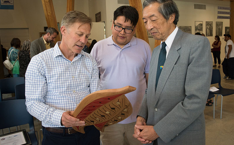 August 26, 2019 Ts'zil Learning Centre Grand Re-Opening and signing of agreement between Capilano University and the Lil'wat Nation. Mason Ducharme (glasses), Director of Ts'zil, David Fung (jacket) and Paul Dangerfield. Rob Newell photo.