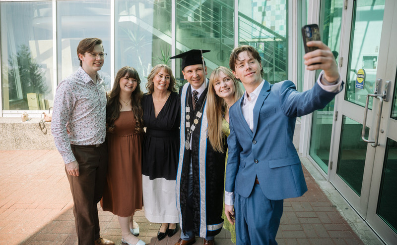 CapU President Dr. Jason Dewling with his family.