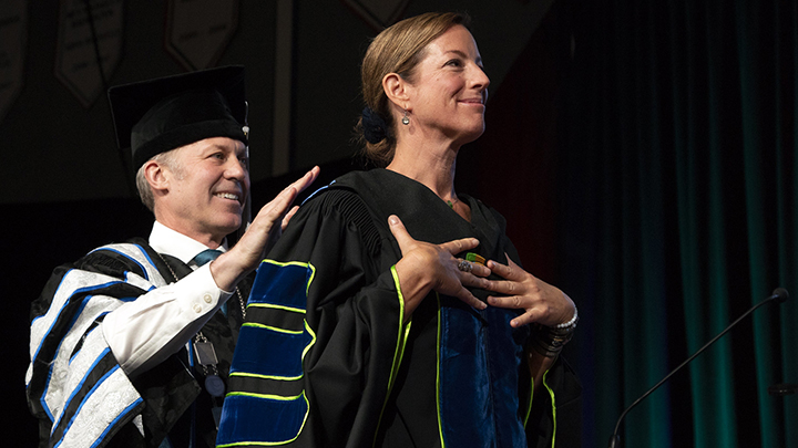 Sarah McLachlan receiving her honorary degree from CapU president Paul Dangerfield. 