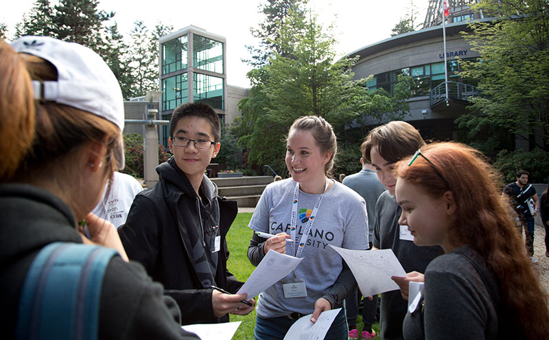 Student volunteer talking to prospective students