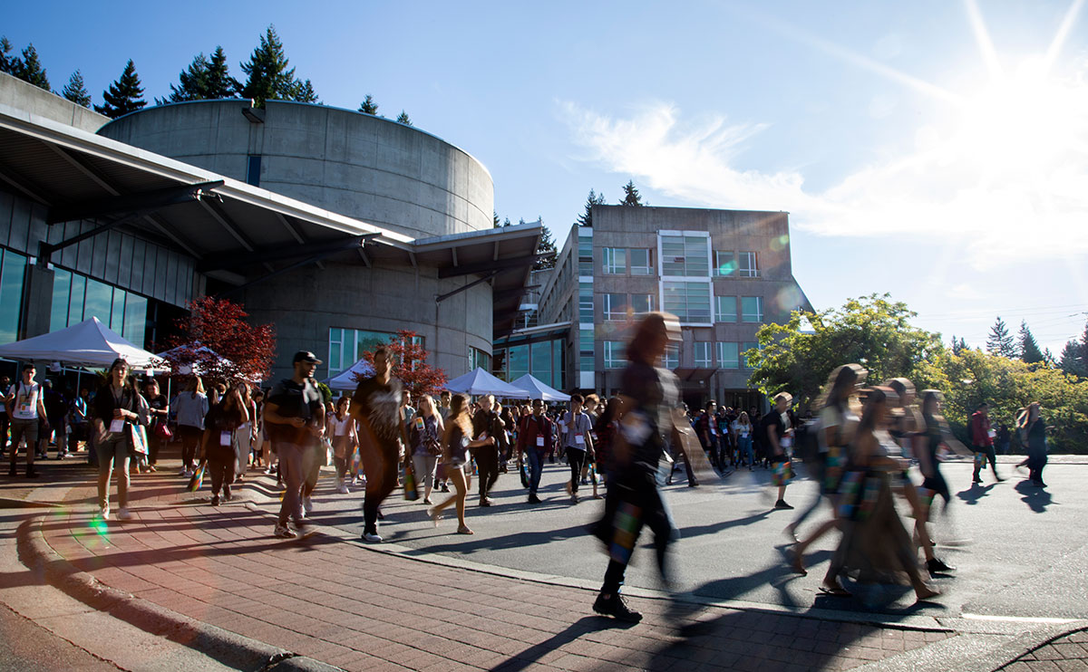 Students outside the Birch Building for orientation